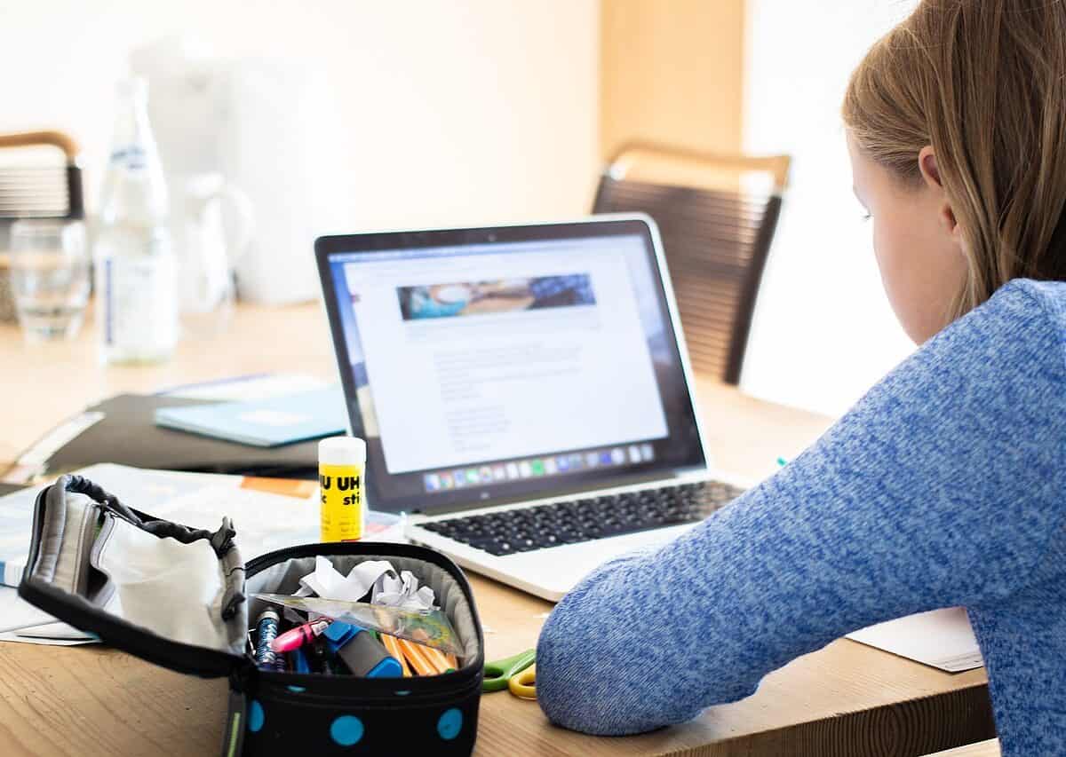 girl looking at laptop